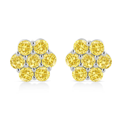 Front view of white metal cluster earrings featuring multiple round yellow gemstones in a prong setting.