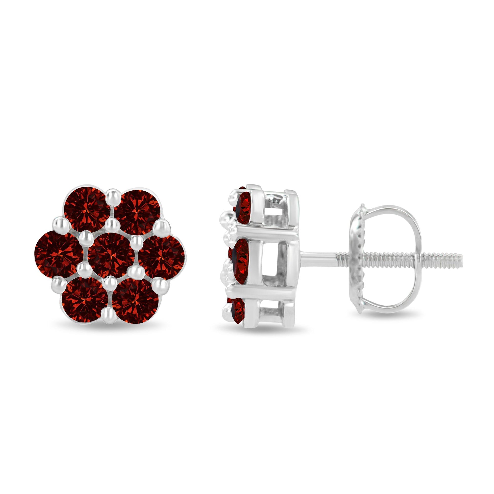 Pair of white metal stud earrings with prong-set round red gemstones arranged in a cluster, shown from front and side angles on a white background.