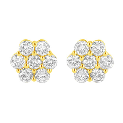Front-facing close-up of a pair of yellow metal earrings designed with multiple round white gemstones in prong settings forming a clustered pattern.