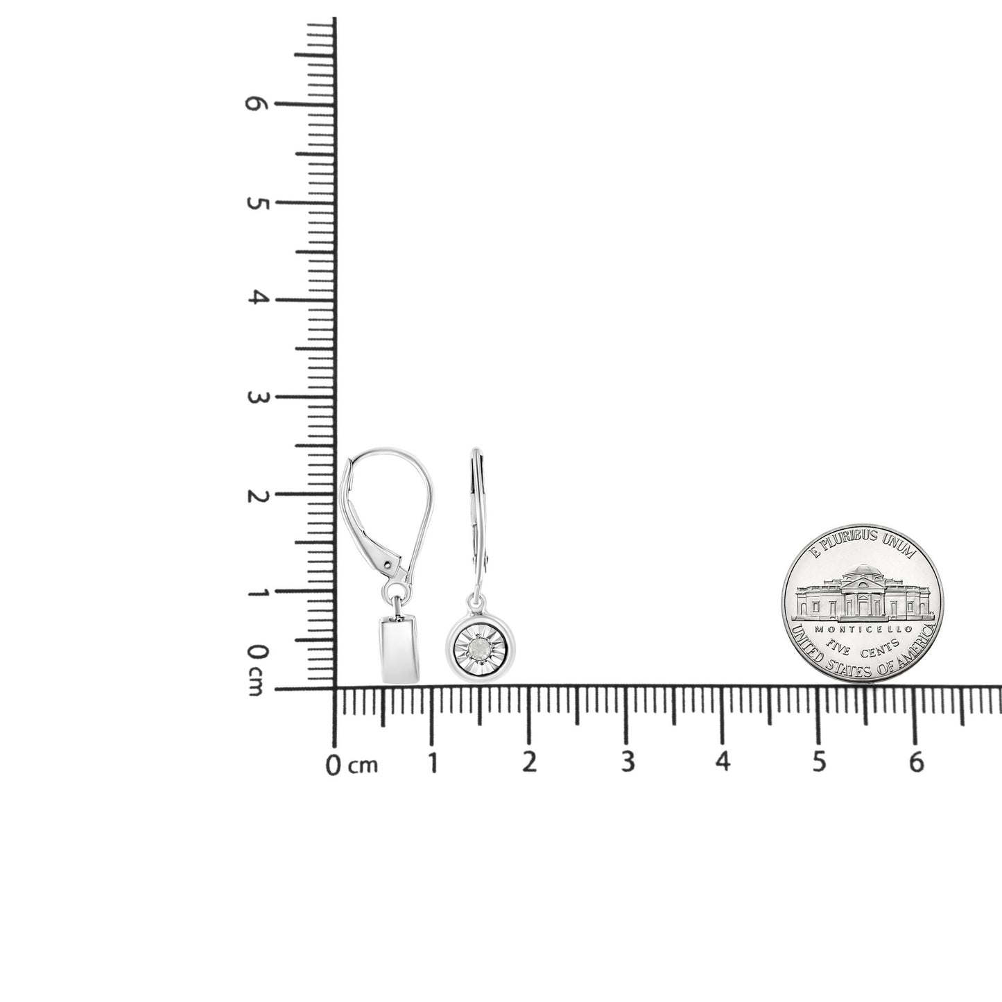 White metal round-shaped earrings with miracle setting white gemstones, displayed side by side on a ruler for size reference, shown from front and side angles.