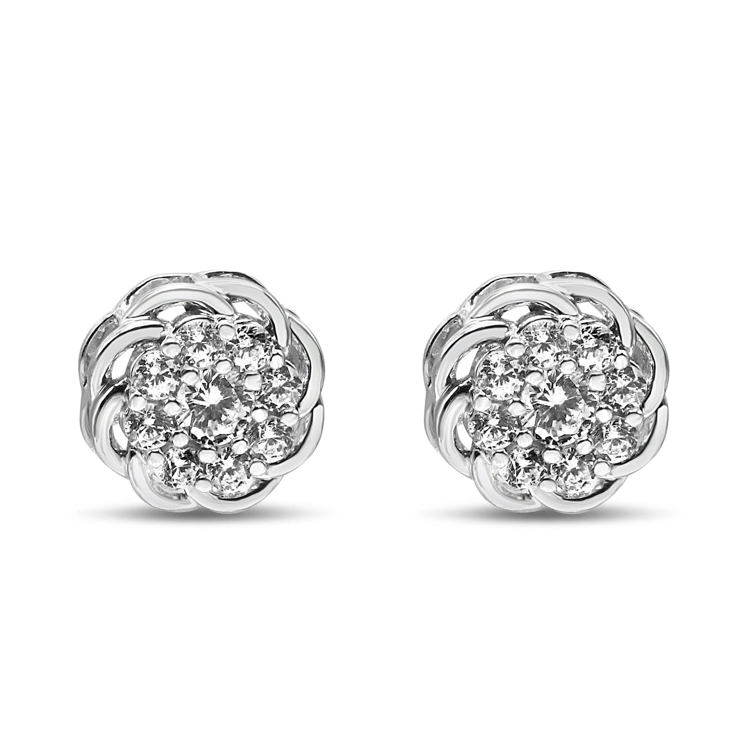 Front view of a pair of white metal earrings with cluster of round white gemstones in prong setting.