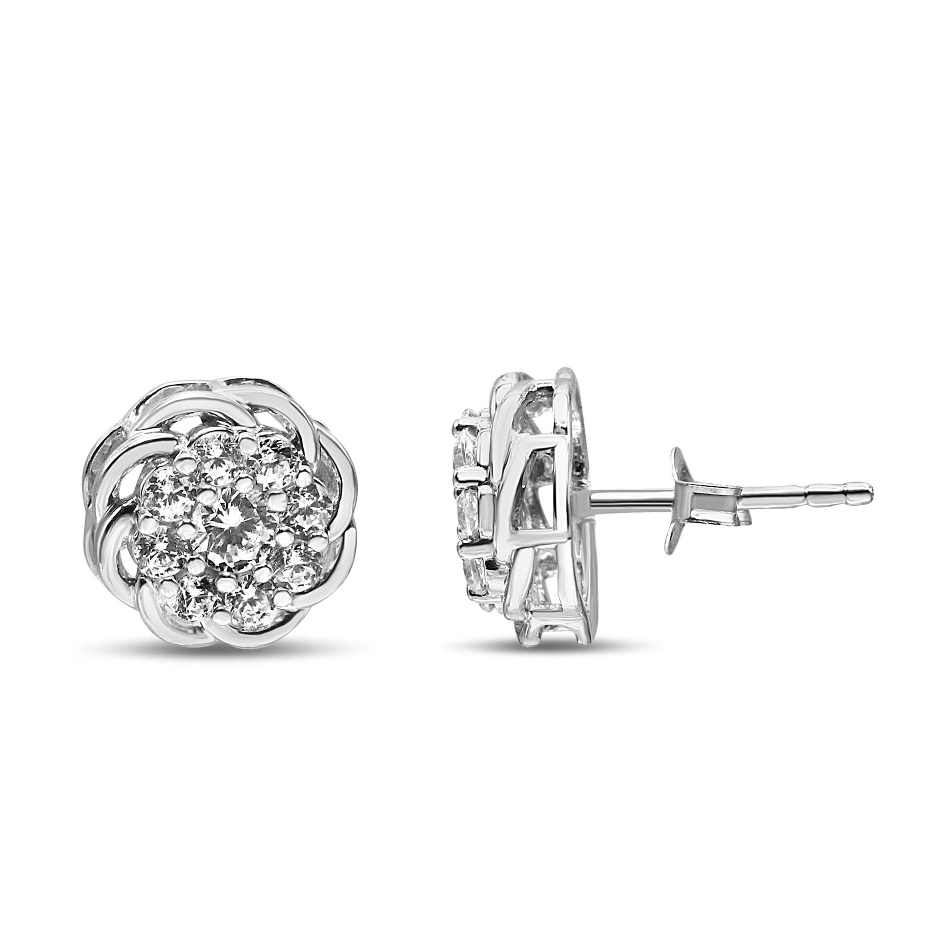 A pair of white metal stud earrings with round white gemstones in prong settings arranged in a circular cluster, shown from the front and side angles.