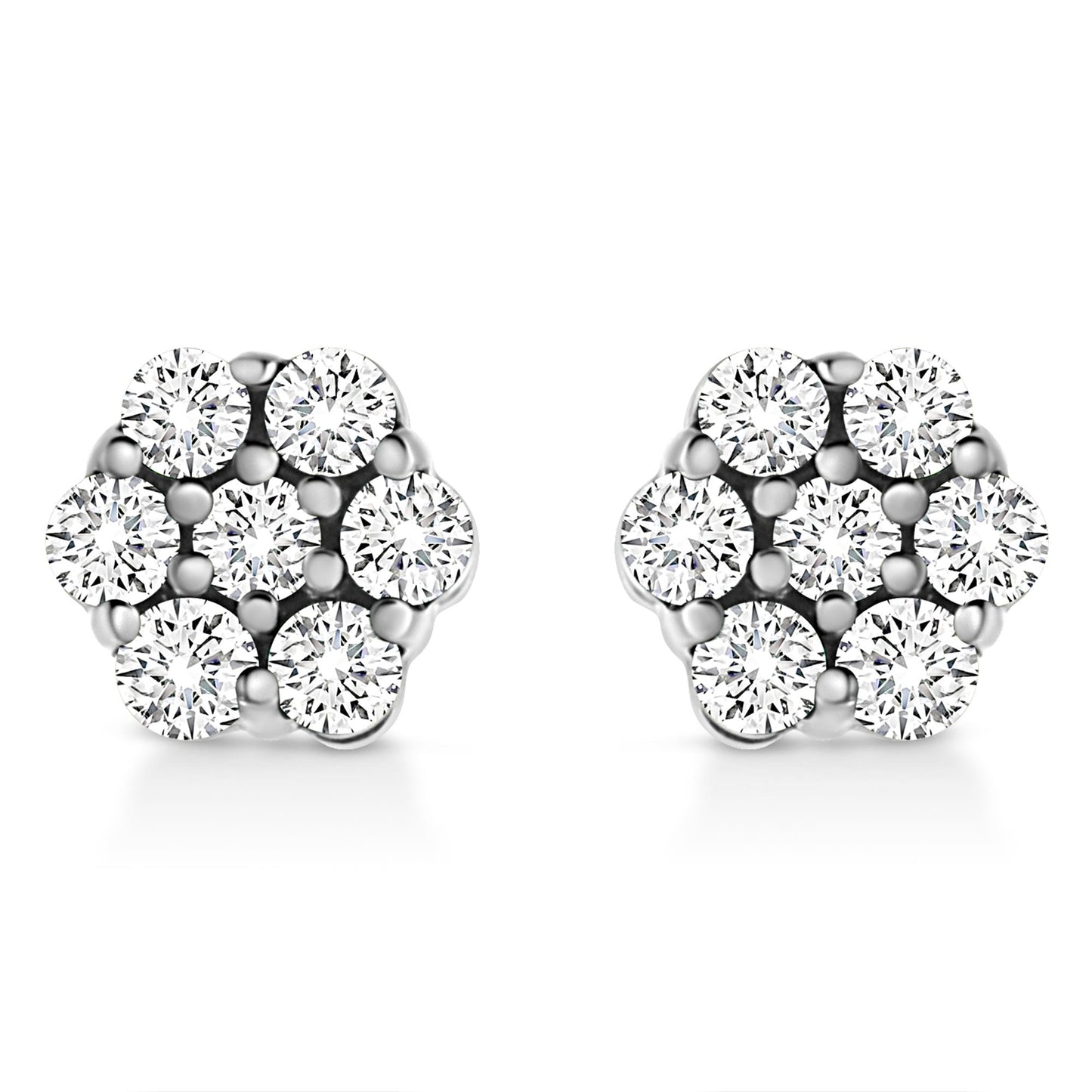 Front angle view of a pair of white metal earrings with round white gemstones in a cluster prong setting.