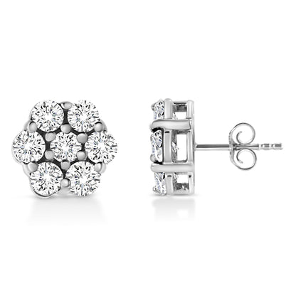 Pair of white metal stud earrings with round white gemstones in prong settings, shown from front and side angles.