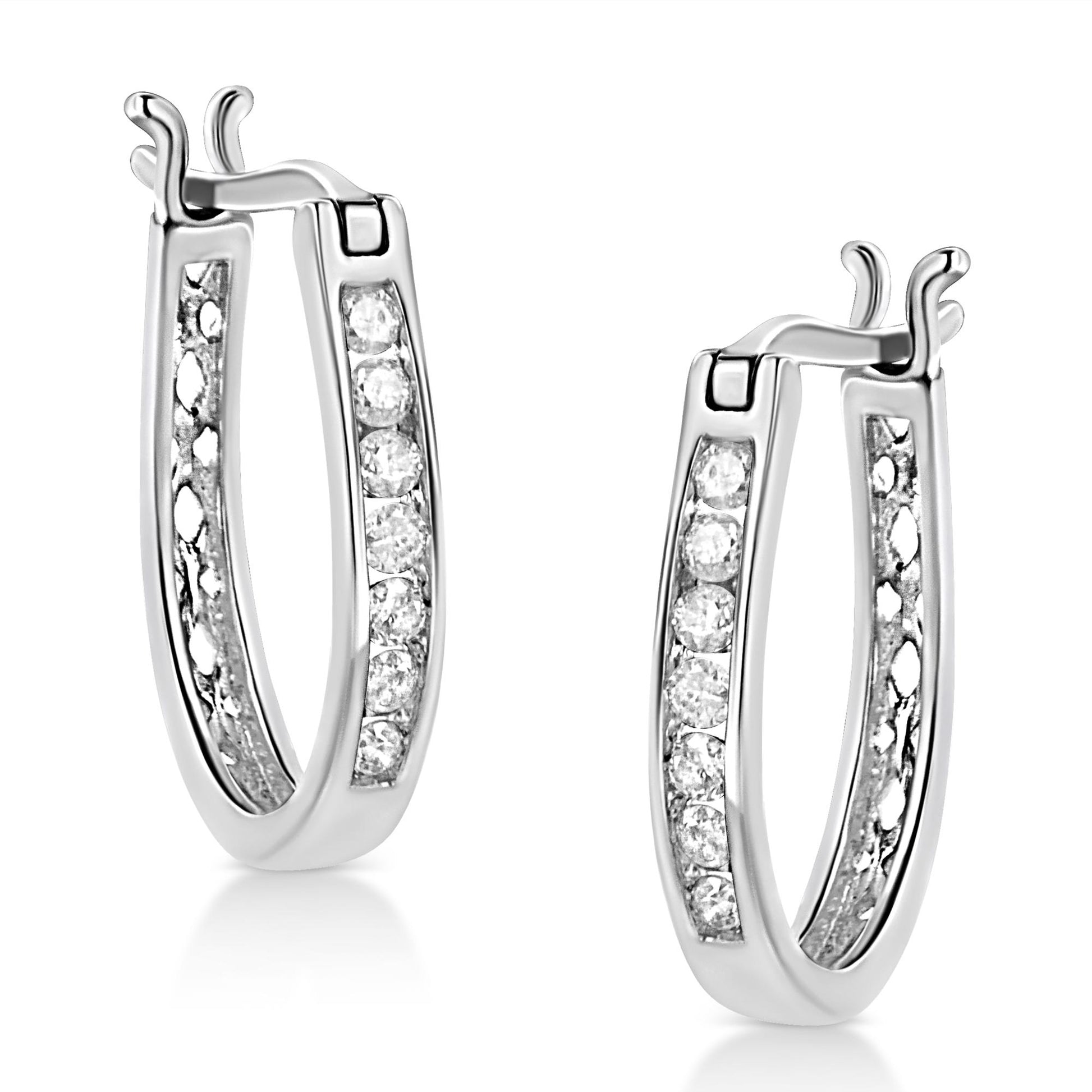 Pair of white metal hoop earrings with channel-set round white gemstones, shown from a slightly angled front view.