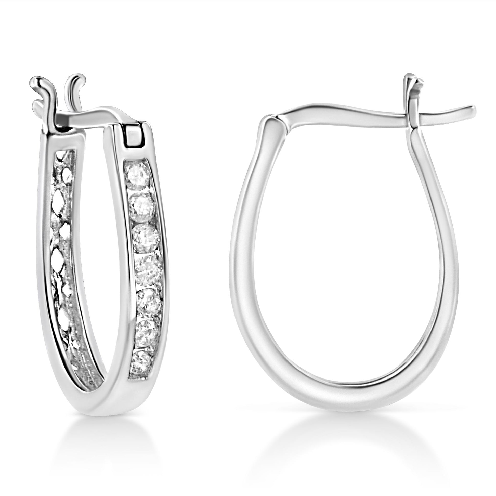 Close-up front and back view of white metal hoop earrings with channel-set round white gemstones along the front outer edge.