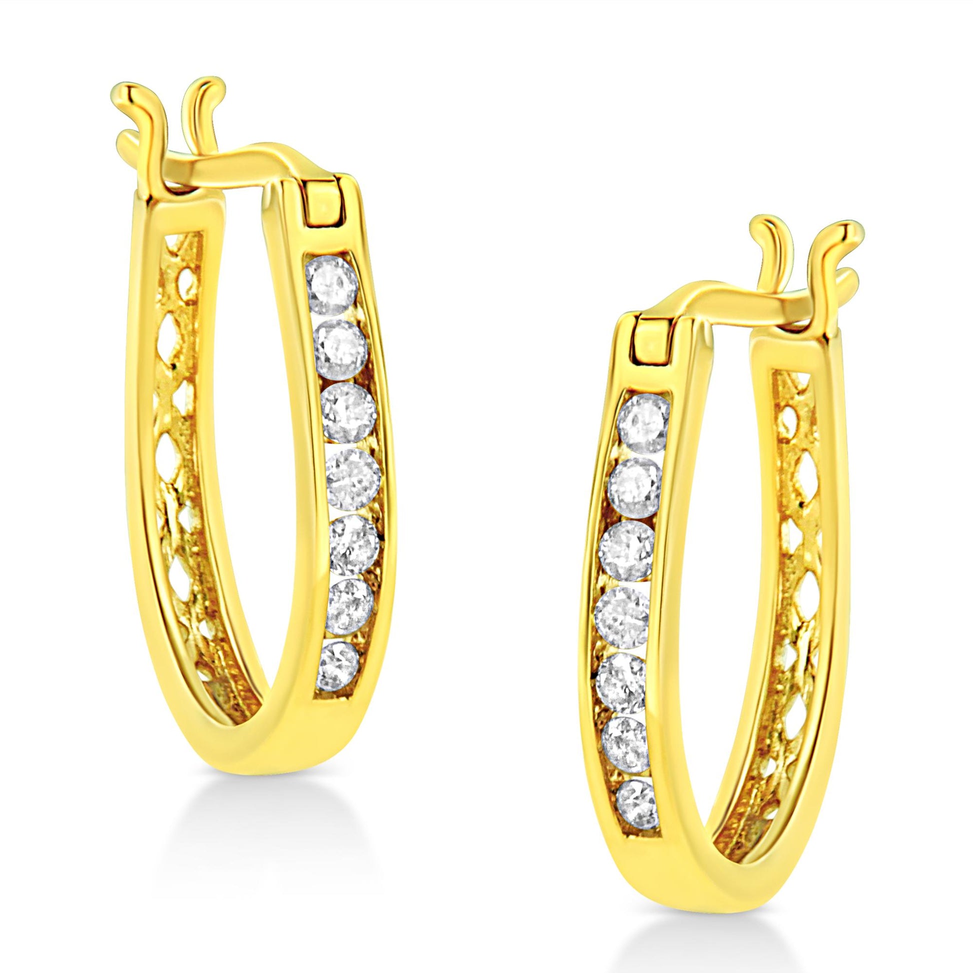 Pair of yellow metal hoop earrings with channel-set round white gemstones, shown in a close-up side angle.
