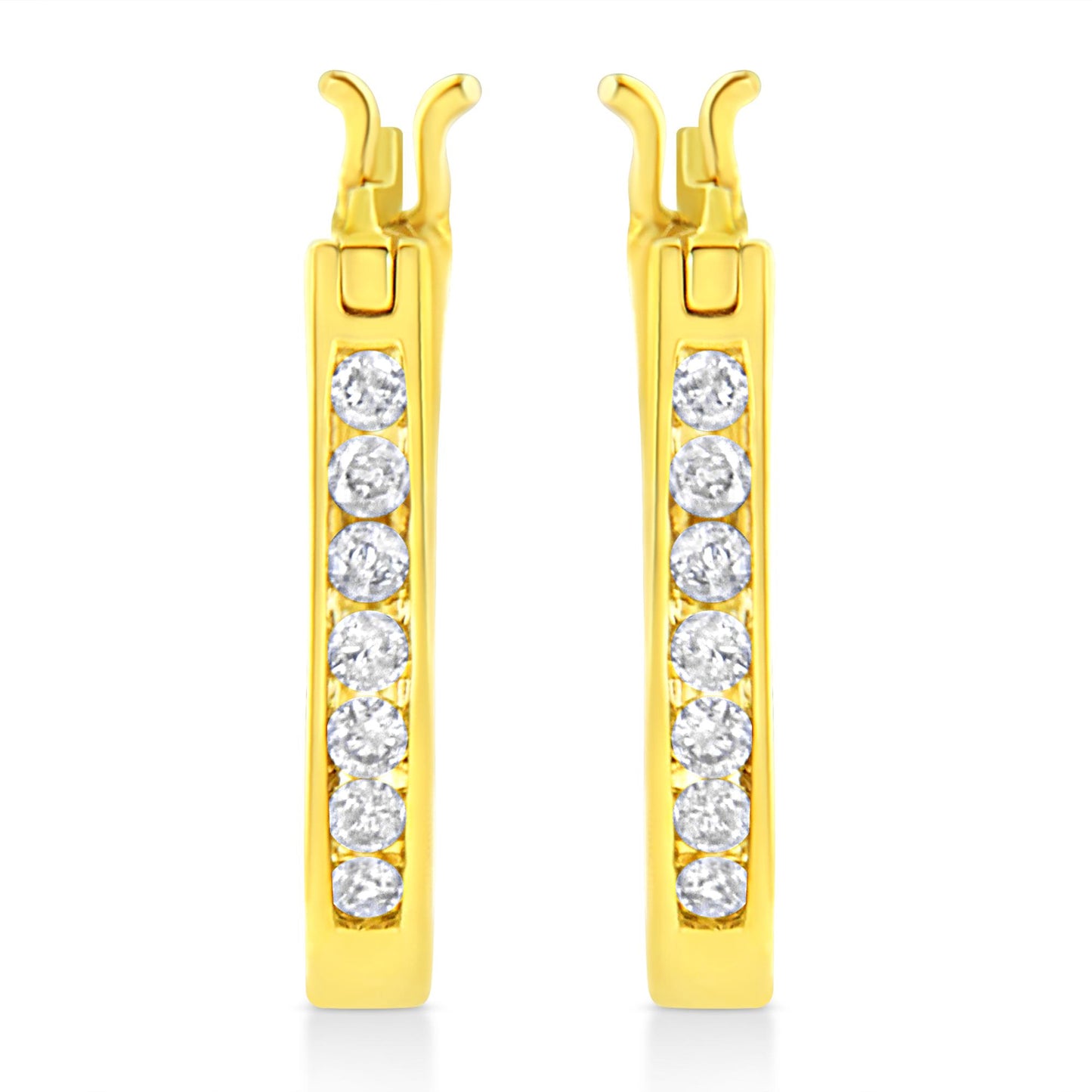 Front view of yellow metal earrings with round white gemstones set in a channel setting along the length.