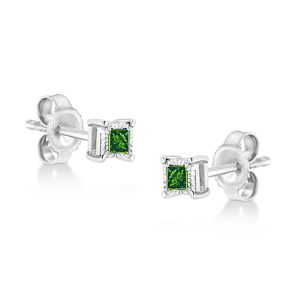 Pair of white metal stud earrings with square green gemstones in a miracle setting, shown in a close-up side angle.