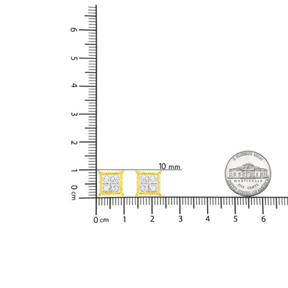 Pair of yellow metal square earrings with white gemstones in invisible setting, shown from front on a ruler and next to a coin for size reference.