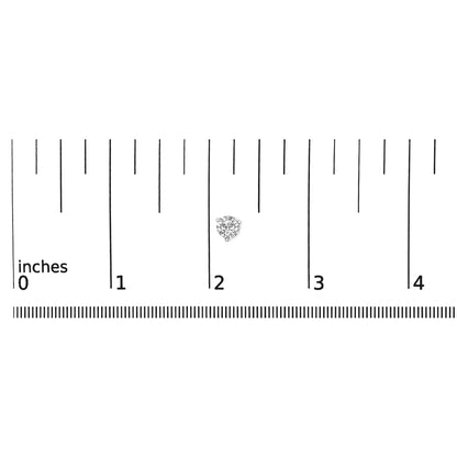 Close-up image of a white round gemstone earring in a three-prong setting placed on a ruler for size reference.