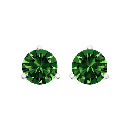 Front view of a pair of white metal stud earrings with round green gemstones set in a three-prong setting.