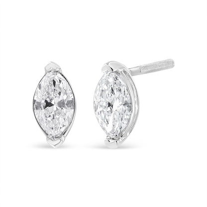 Pair of white metal stud earrings with marquise-shaped white gemstones in prong settings, shown from a front and side angle.