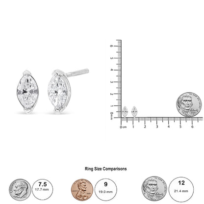 Pair of white metal earrings with marquise-shaped white gemstones in prong settings, shown in a side angle view; also displayed on a ruler and next to coins for size reference.