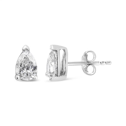 Front and side view of white metal stud earrings with pear-shaped white gemstones in 3-prong settings, shown against a white background.