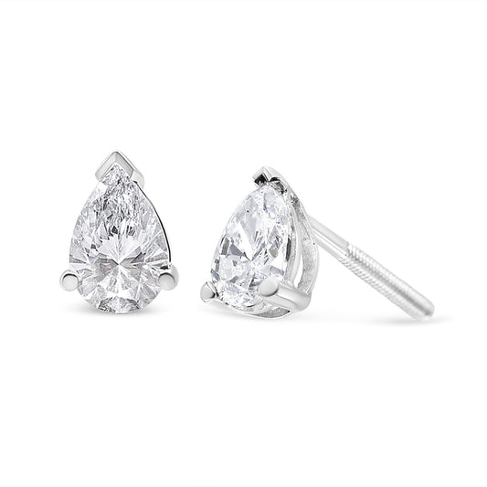 Pair of white metal earrings with pear-shaped white gemstones in 3-prong settings, shown from a front and side angle on a white background.