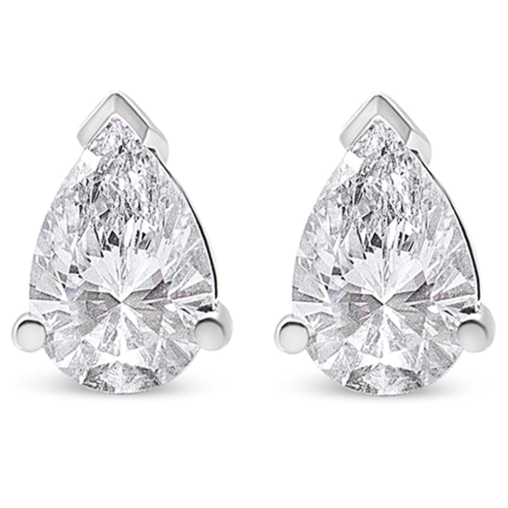 Front view of a pair of white metal earrings each featuring a pear-shaped white gemstone in a three-prong setting.