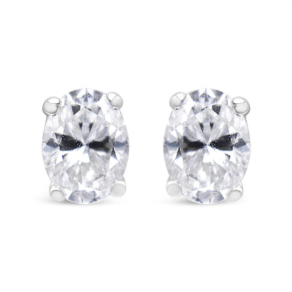 Close-up front view of a pair of white metal stud earrings featuring oval-shaped white gemstones in 4-prong settings.