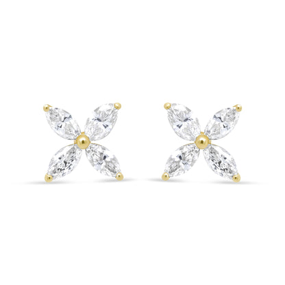 Front view of yellow metal earrings with four marquise-shaped white gemstones arranged in a floral pattern.