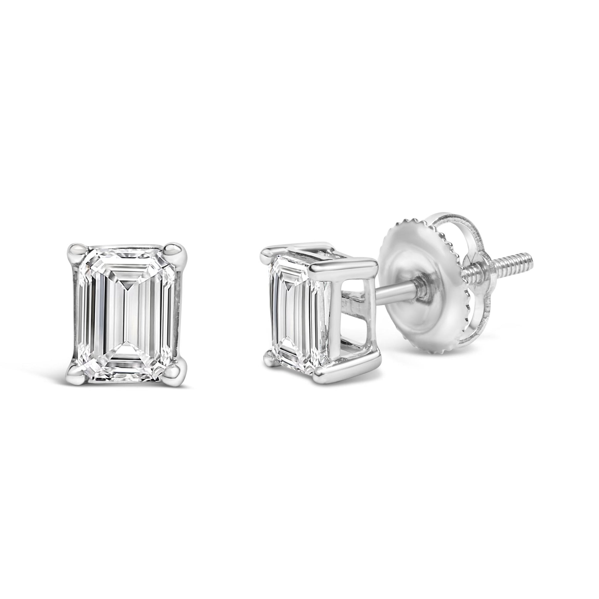 Pair of white metal stud earrings with emerald-shaped white gemstones in 4-prong settings, shown from front and side angles.