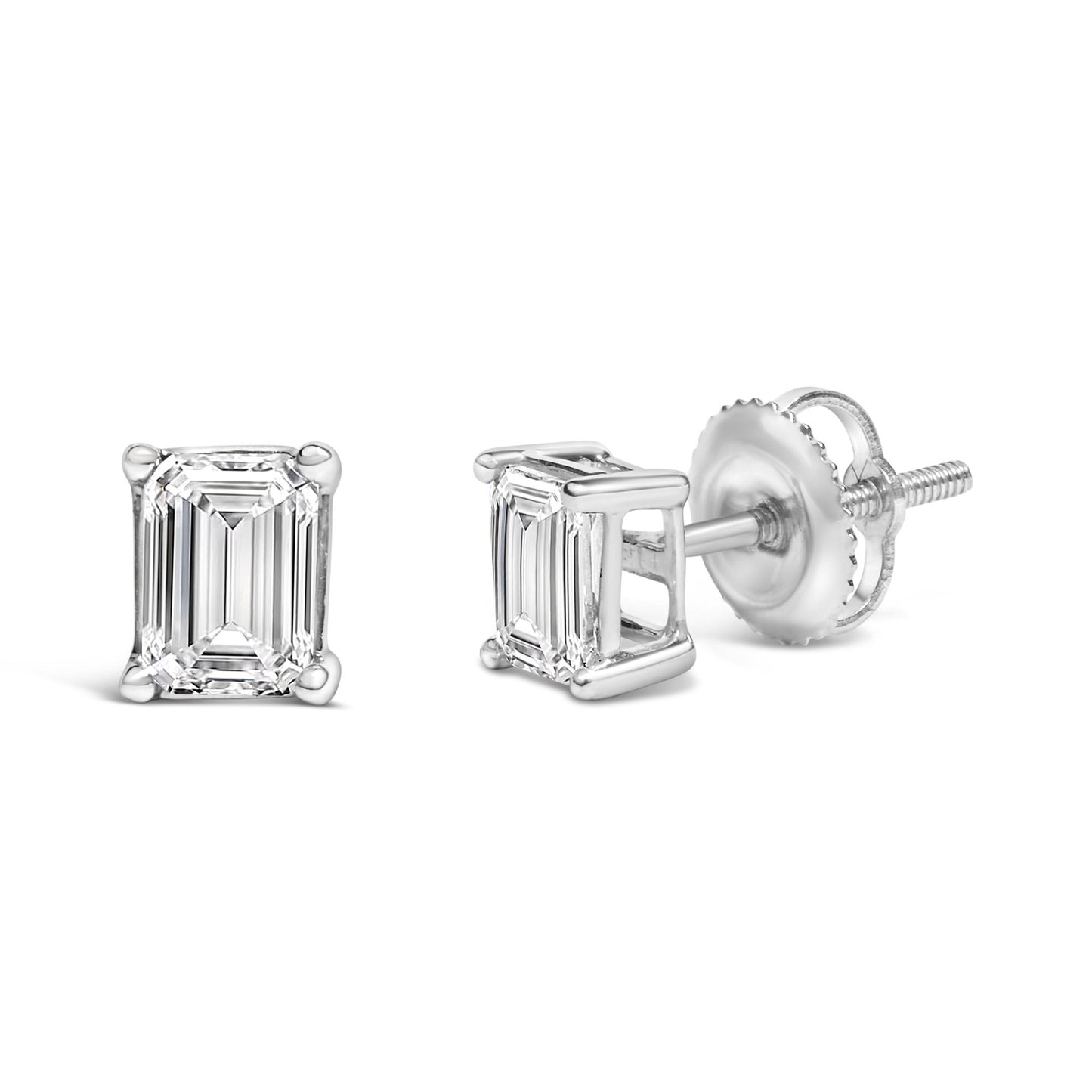 Pair of white metal stud earrings with emerald-shaped white gemstones in 4-prong settings, shown from front and angled side views.