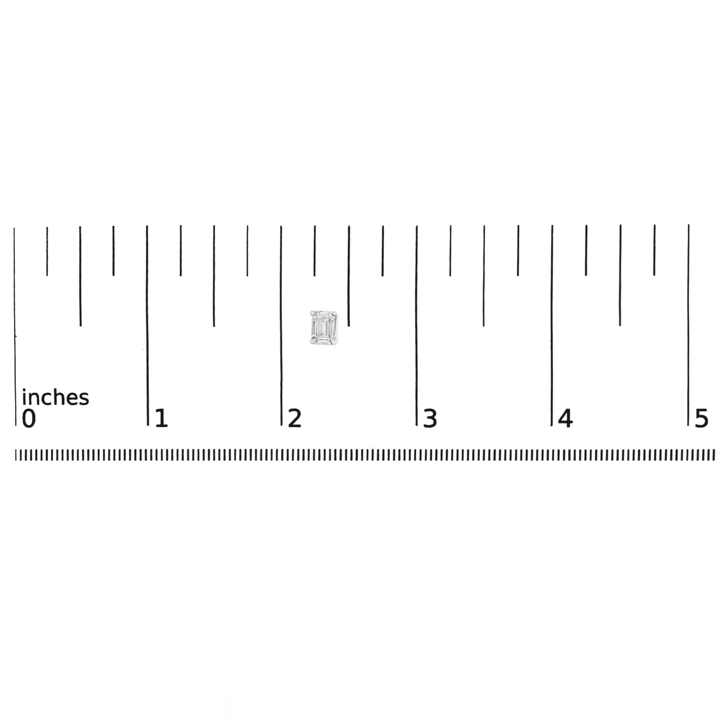 Top-down view of white metal emerald-shaped earring with two white gemstones in 4-prong setting, placed on a ruler for size reference.