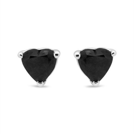 Front view of white metal earrings with heart-shaped black gemstones in prong settings.