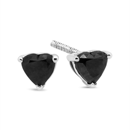 Close-up front and side view of white metal stud earrings with heart-shaped black gemstones in prong settings.