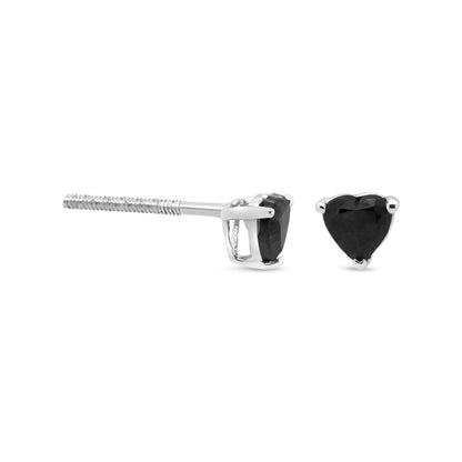 Close-up side and front view of white metal heart-shaped black gemstone stud earrings.