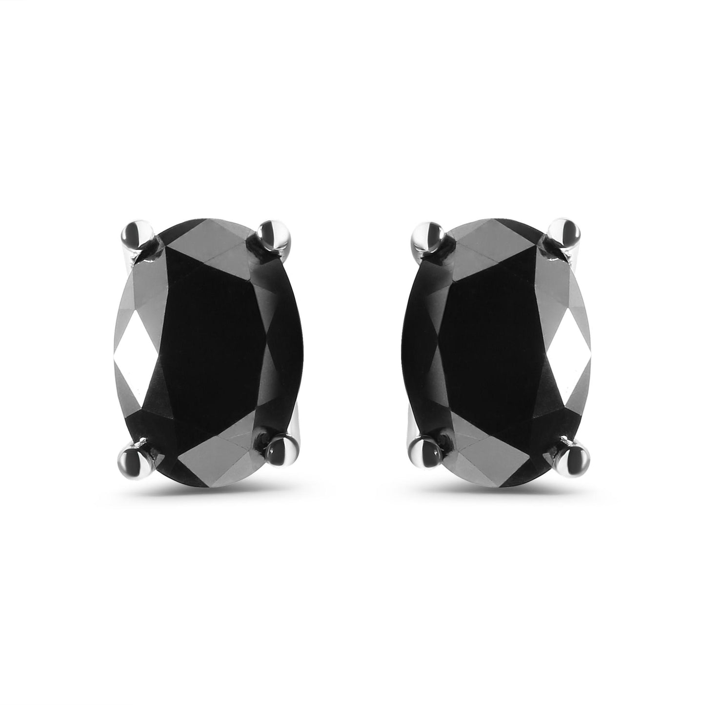 Front-facing close-up of white metal earrings with oval-shaped black gemstones in prong settings.