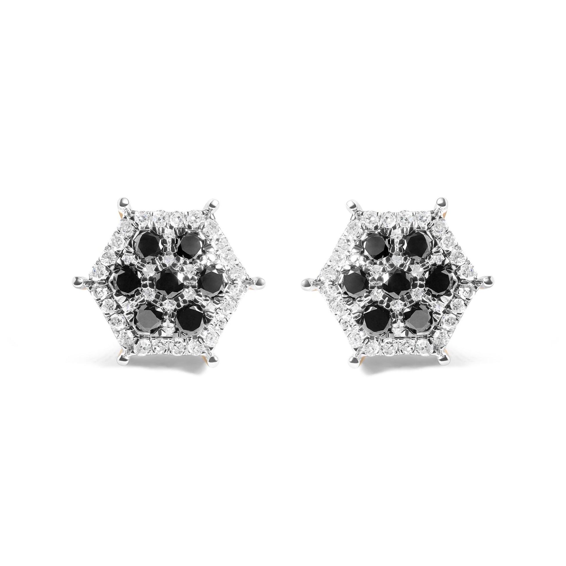 Front view of hexagonal yellow metal earrings featuring black and white round gemstones in prong settings.