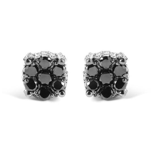 Front-facing close-up of yellow metal earrings featuring round black and white gemstones in prong settings.