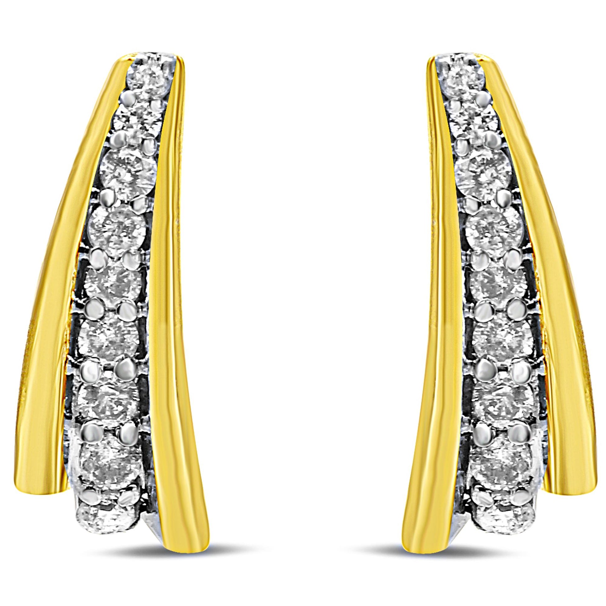 Pair of yellow metal earrings with a curved design, featuring a row of round white gemstones in prong settings, shown from the front angle.