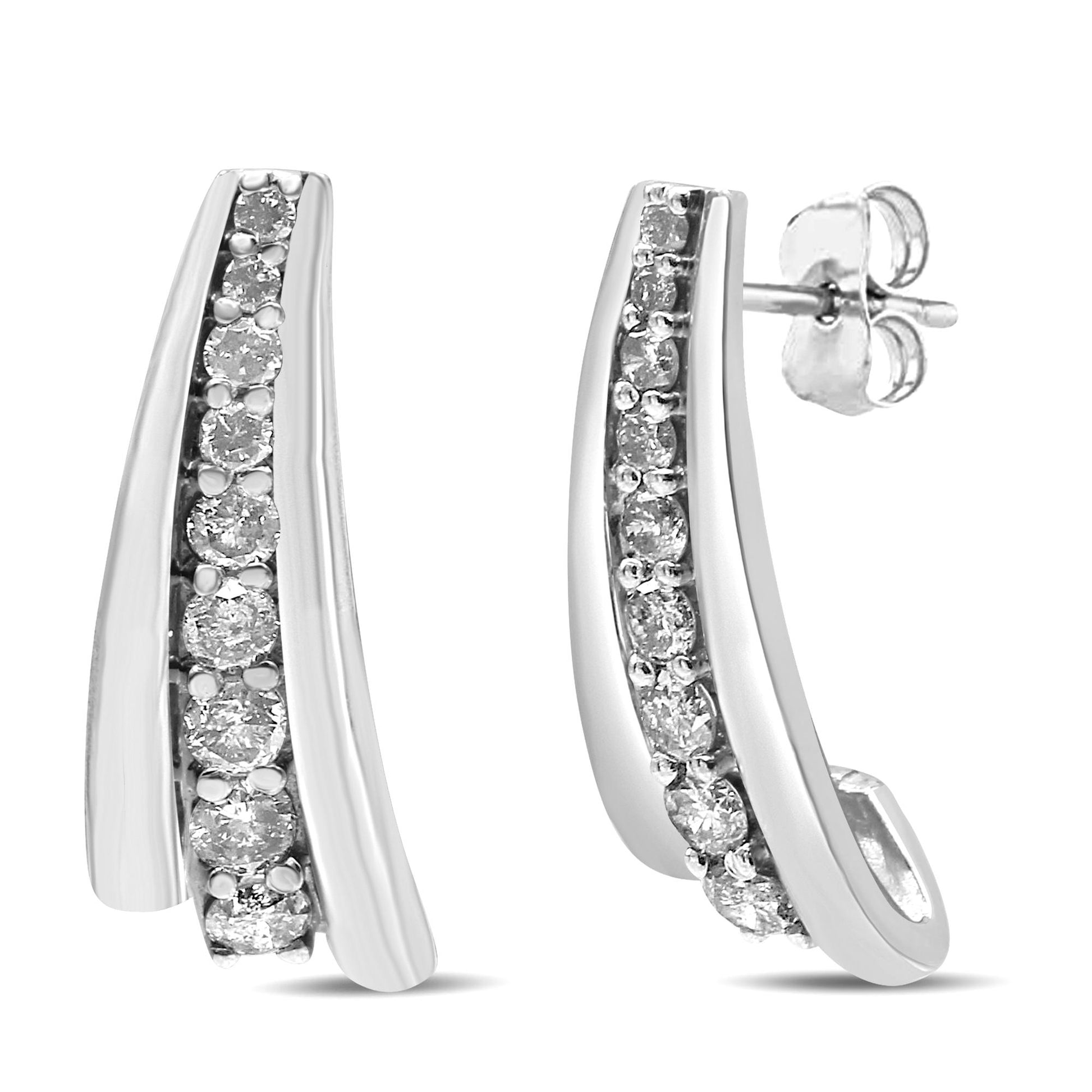 Close-up front and side view of white metal earrings with a curved design featuring a row of round white gemstones in prong settings.