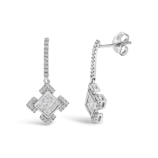 Close-up front and side angle of white metal dangling earrings with vertical rows of round white gemstones and a central square-shaped cluster of princess-cut white gemstones surrounded by smaller round white gemstones.