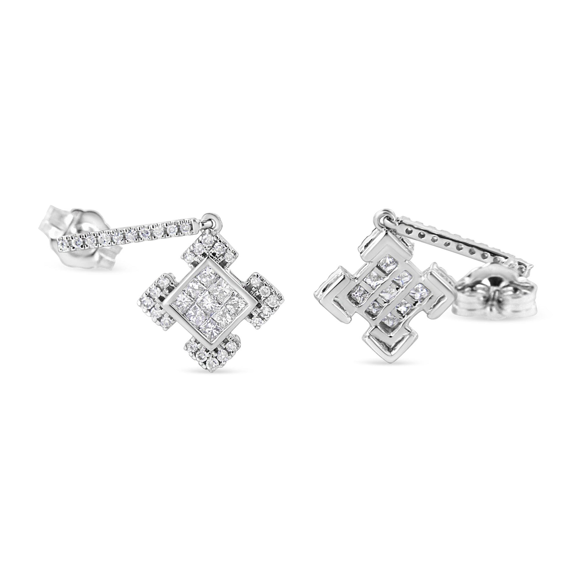 Close-up front angle view of a pair of white metal stud earrings featuring square shapes with invisible-set princess white gemstones surrounded by round white gemstones in 4-prong settings. The earrings are shown on a white background.