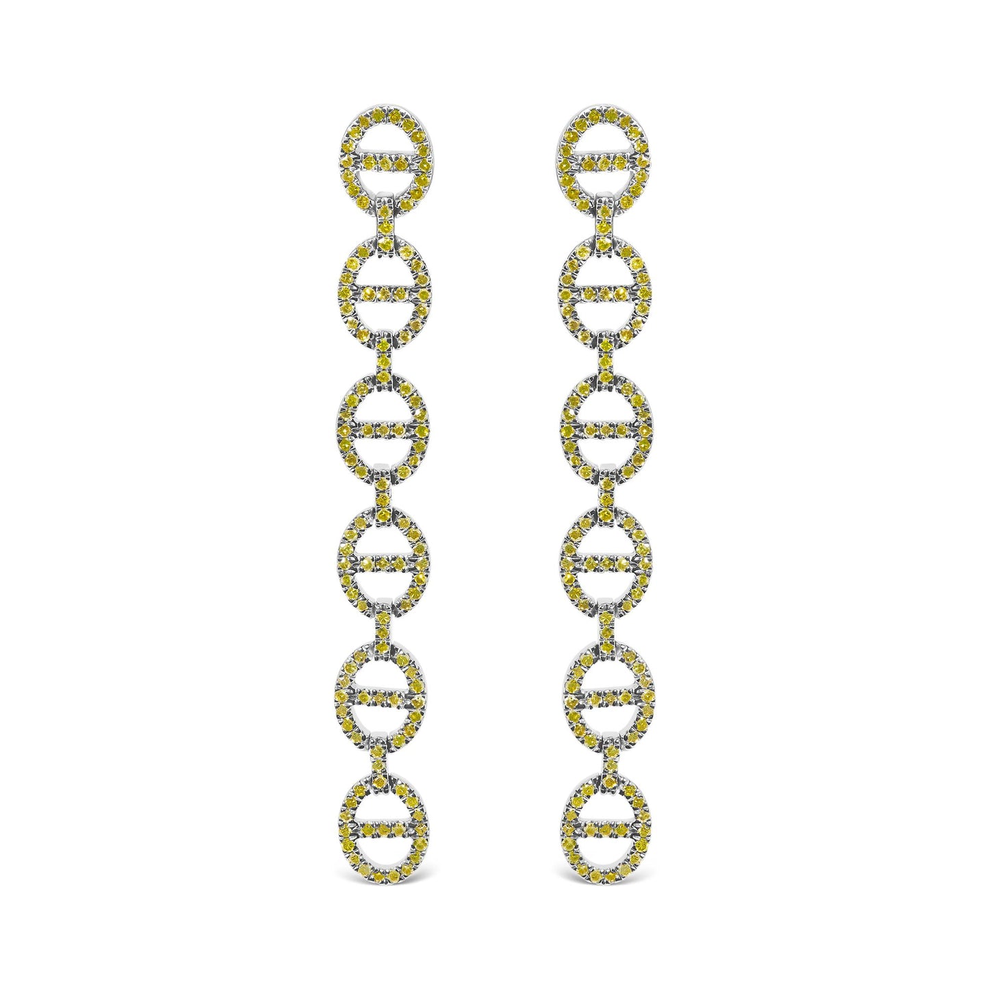 Close-up front view of white metal earrings with multiple linked oval shapes, each adorned with round yellow gemstones in prong settings.