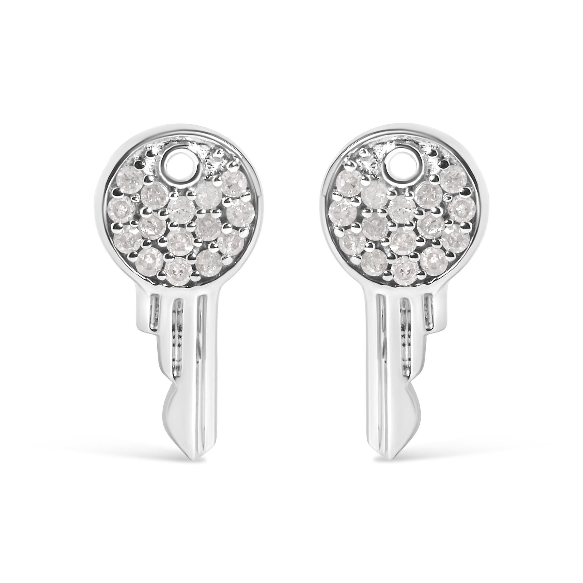 Close-up front view of a pair of white metal round earrings with multiple small white gemstones in prong settings.