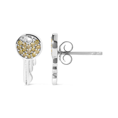 Close-up side angle of white metal stud earrings with round yellow gemstones in prong settings clustered on the front.