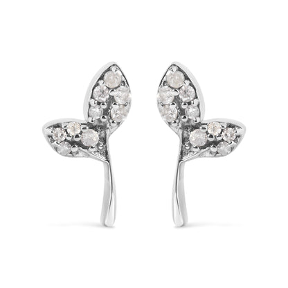 Front view of a pair of white metal earrings shaped like two connected hearts, each heart adorned with multiple round white gemstones in prong settings.
