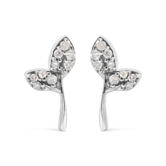 Front view of a pair of white metal earrings shaped like two connected hearts, each heart adorned with multiple round white gemstones in prong settings.
