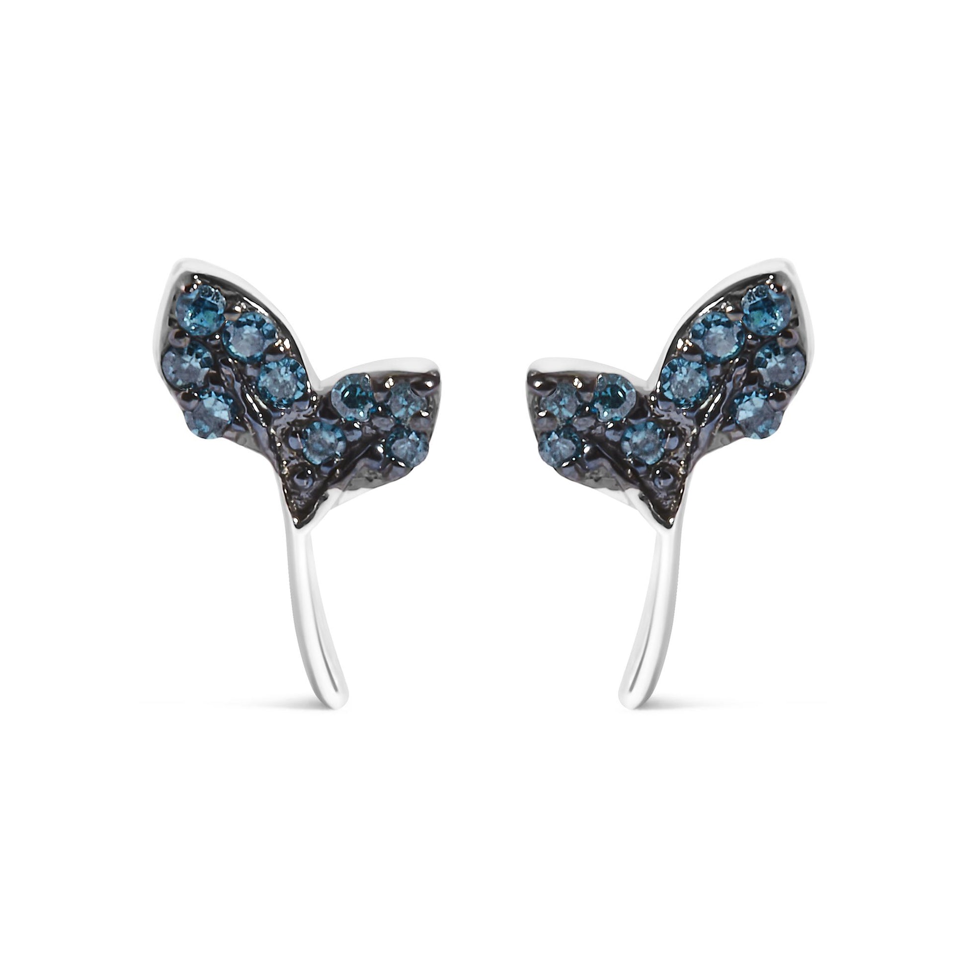 Close-up front view of a pair of white metal earrings shaped like butterflies, adorned with multiple round blue gemstones in prong settings.
