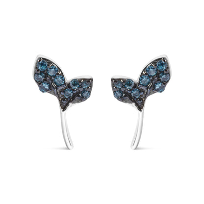 Close-up front view of a pair of white metal earrings shaped like butterflies, adorned with multiple round blue gemstones in prong settings.