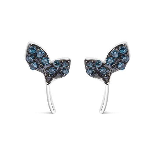 Close-up front view of a pair of white metal earrings shaped like butterflies, adorned with multiple round blue gemstones in prong settings.