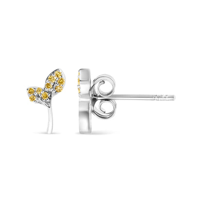 Close-up side angle of a single white metal stud earring shaped like a butterfly wing, adorned with multiple round yellow gemstones in prong settings.