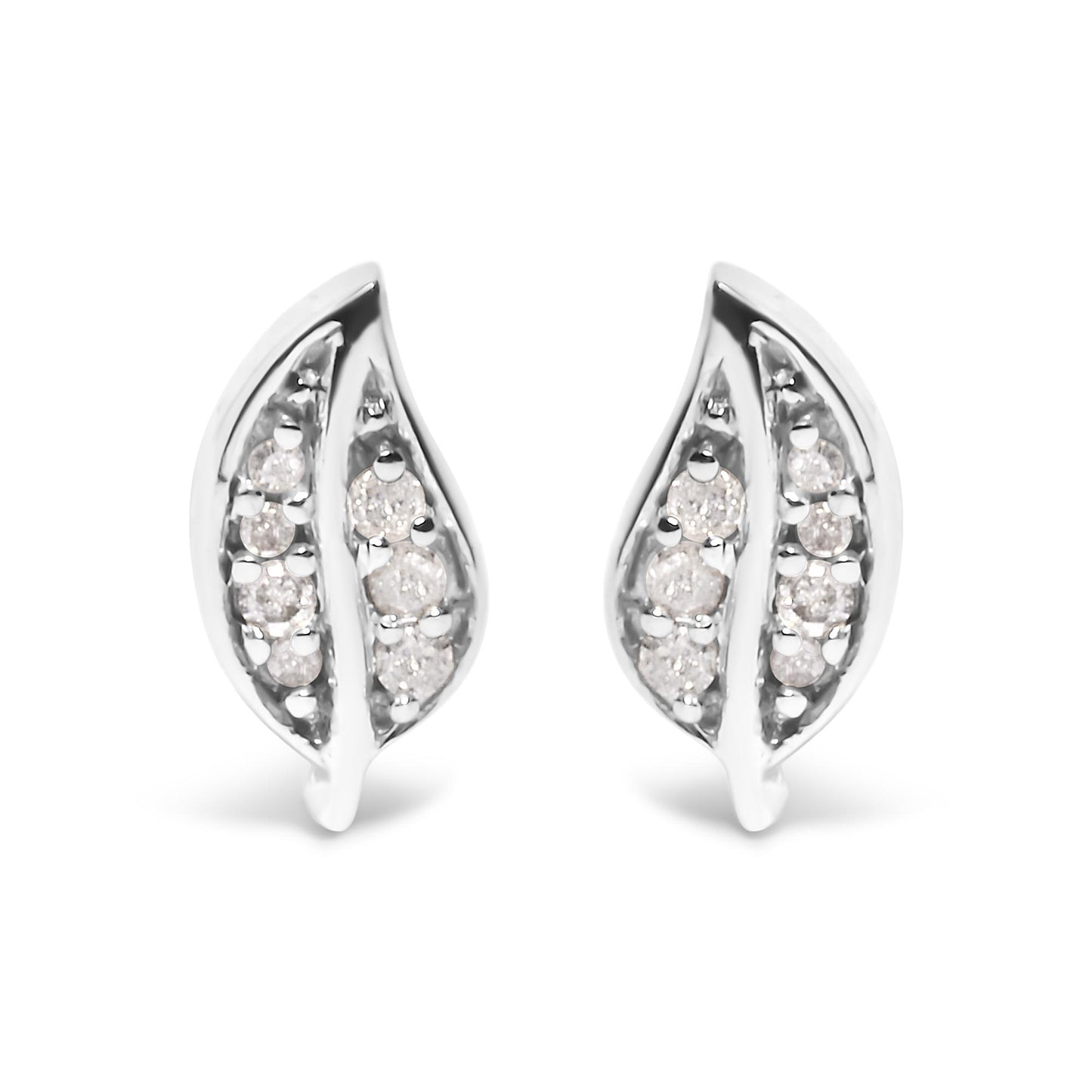 Front view of a pair of white metal earrings shaped like elongated leaves, each set with multiple round white gemstones in prong settings.