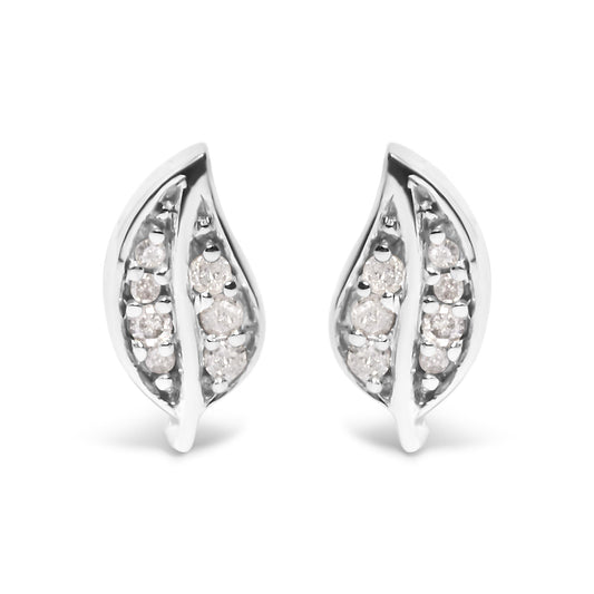 Front view of a pair of white metal earrings shaped like elongated leaves, each set with multiple round white gemstones in prong settings.