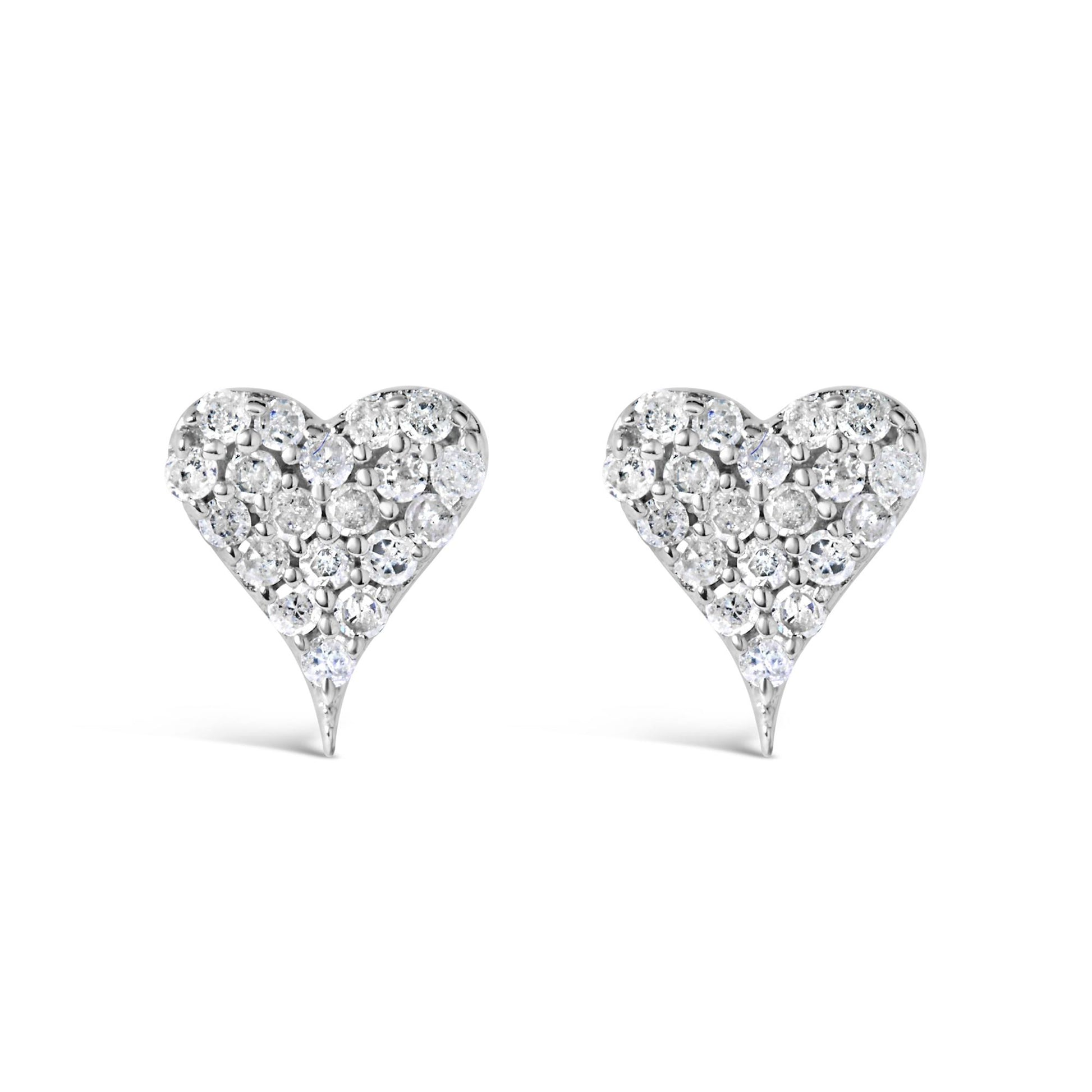 Front view of a pair of white metal heart-shaped stud earrings with multiple round white gemstones in prong settings.