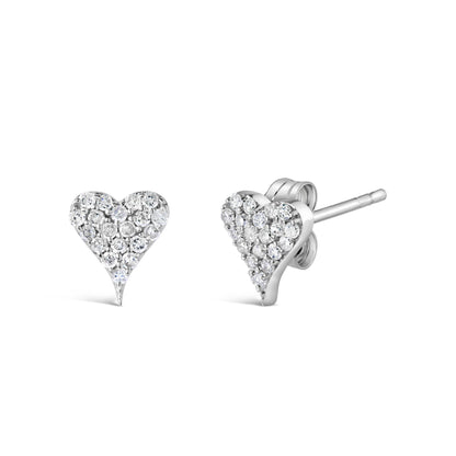 Front and side angled view of white heart-shaped earrings set with multiple round white gemstones.