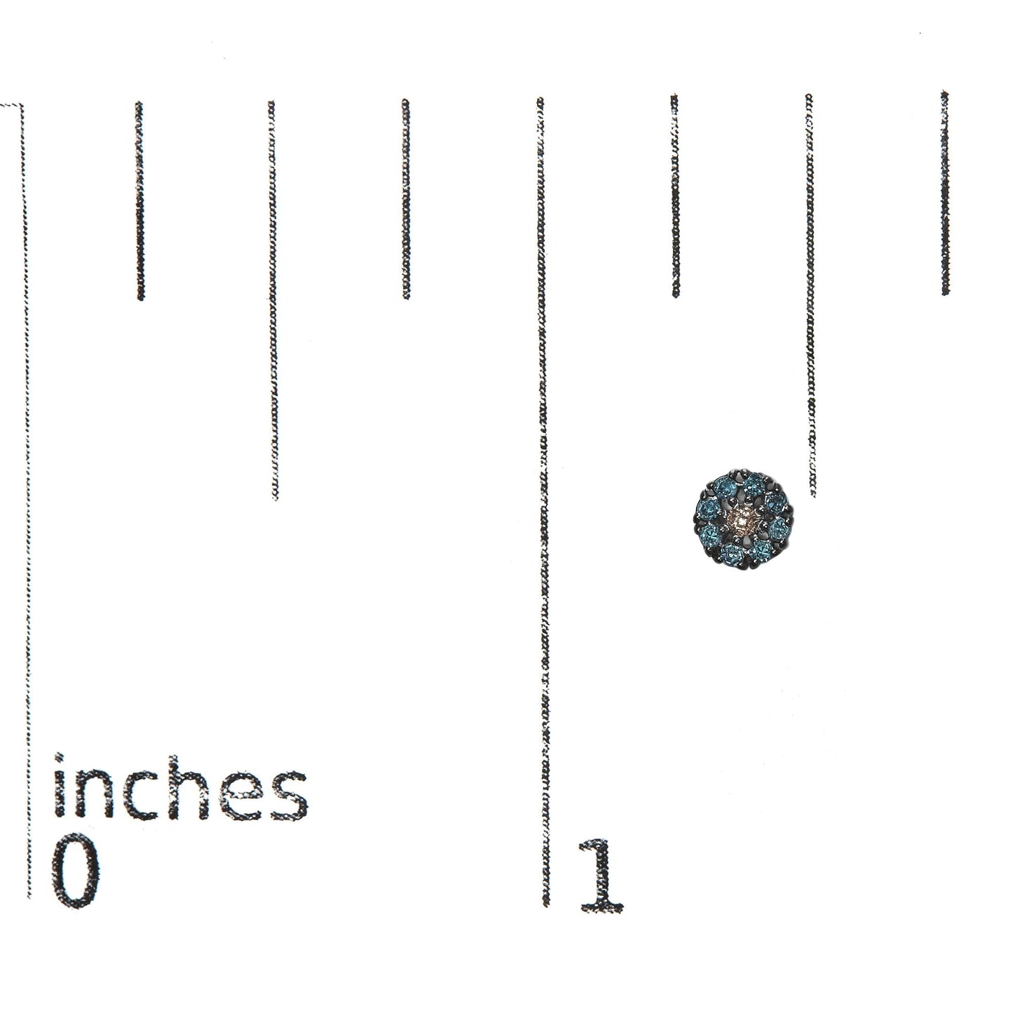 Close-up top view of a white metal round stud earring with prong-set blue gemstones, placed on a ruler for size reference.